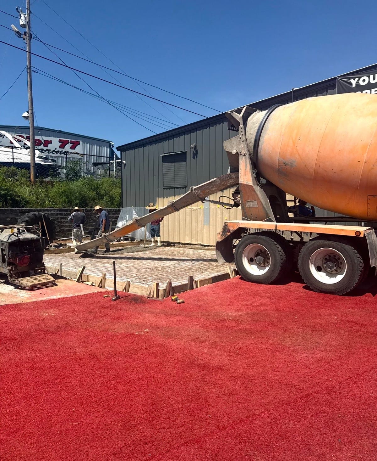 Finished Commercial Concrete job in Charlotte, North Carolina by Local Concrete Lake Norman — clean control-joint pattern, smooth troweled surface, full property protection during pour.
